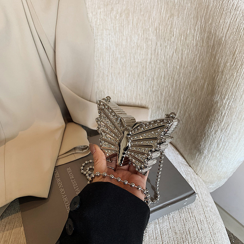 Bolsa de cena de moda mariposa para mujeres 2025 nueva cadena de diamante simple bolso de hombro mini bolso de lápiz labial de diamante