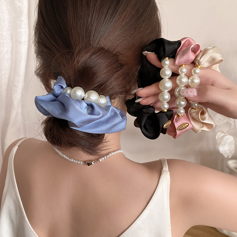 Estilo francés Hepburn perla intestino grueso anillo para el cabello temperamento femenino bola baja cuerda para el cabello retro pequeña fragancia cuerda para el cabello atado
