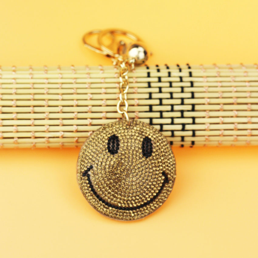 Nuevo creativo cara sonriente coreana llavero de diamante de moda borda de dama bolsos colgantes joyerías de comercio exterior al por mayor