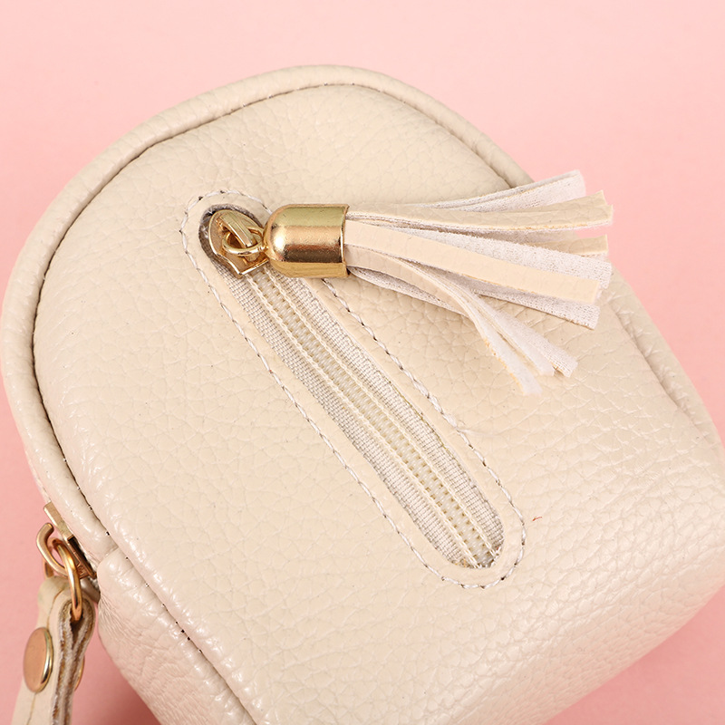 [Venta al por mayor de fábrica] nueva pequeña mochila monedero estudiante llavero de una sola pieza borla bolso de la moneda