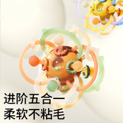 科の巣のマンハッタンの手はボールをつかんで歯のゴムの益智をかむことができます。