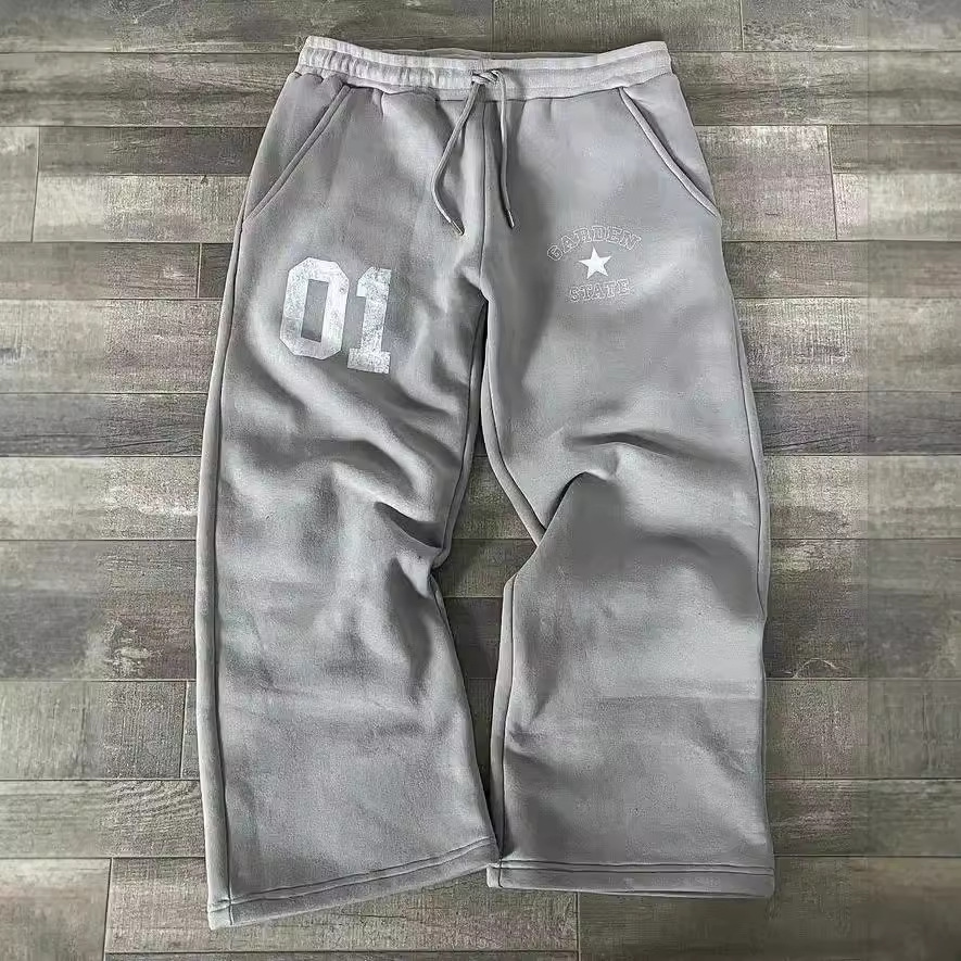 Tarpvalstybinės europietiškos ir amerikietiškos mados raidėmis margintos kelnės tampriu juosmeniu, laisvu, madingos vyriškos ir moteriškos sportinės kelnės_voghion.com