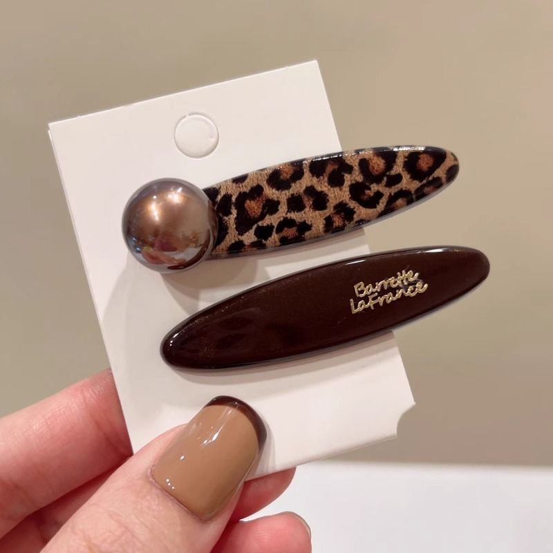 Clip de cabello de flor de leopardo para mujeres clip de cabello de alto nivel frente clip de frangeo 2025 nuevo clip lateral clip de cabello toque