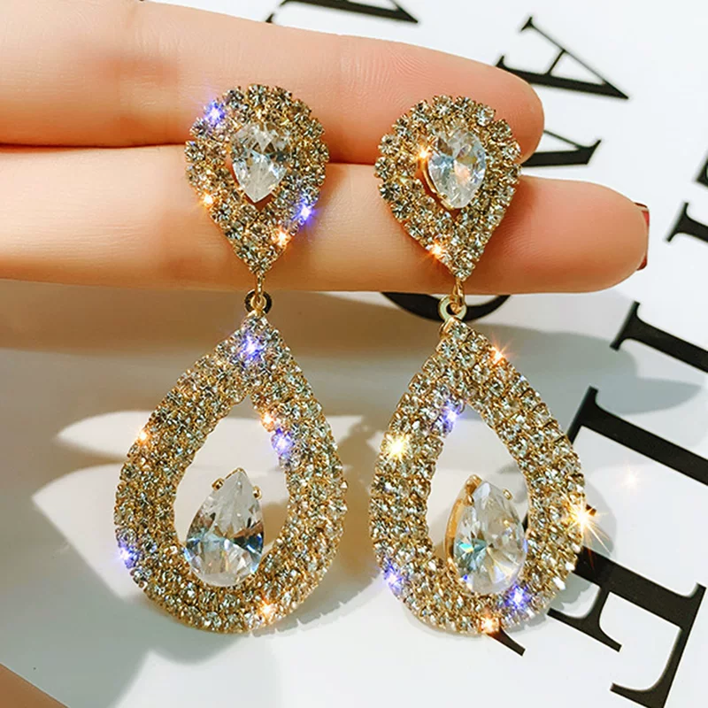 Design elegant earrings, high-quality style, micro incrustation, diamond encrusted