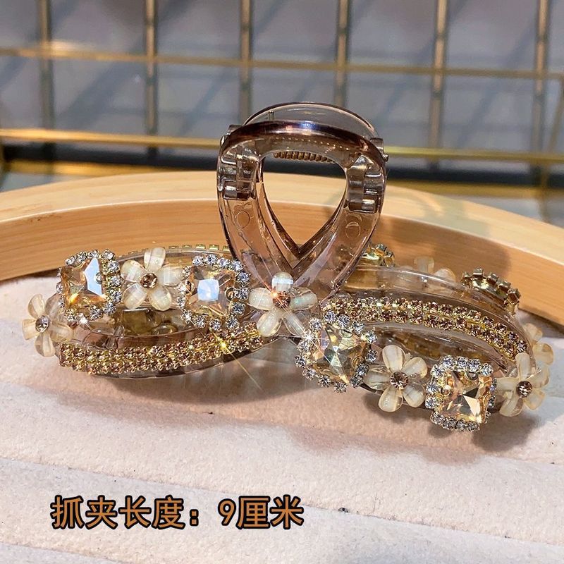 新しいファッショナブルでエレガントな茶色の輝くダイヤモンドクリップ、甘い四つ葉の花の爪ダイヤモンドクリップ、サメクリップヘアクリップ、ハイエンドのヘアアクセサリー|undefined