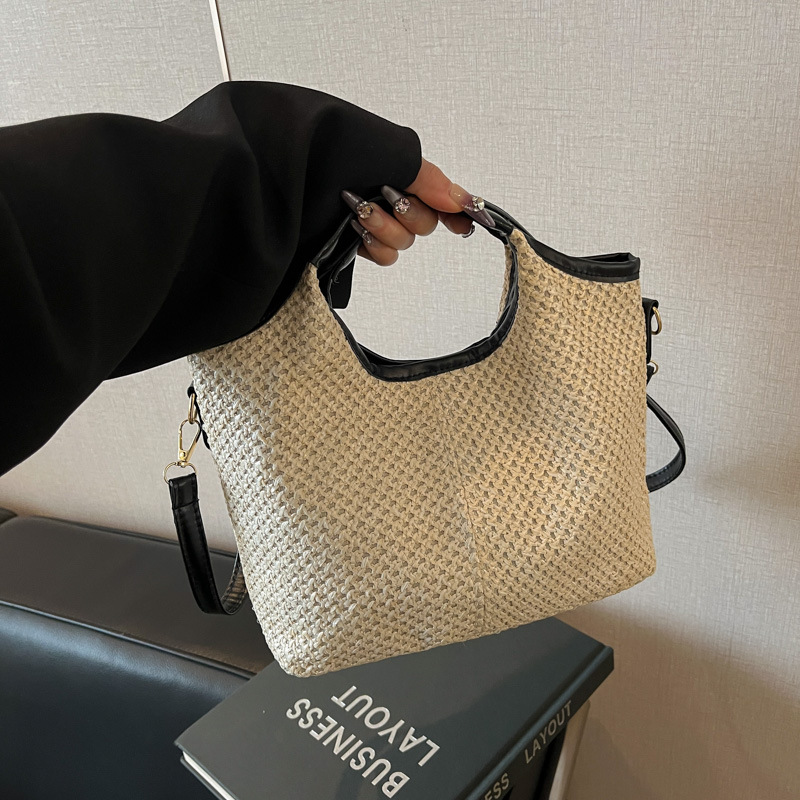 2025 este año popular bolsas de tejido de mano de mujer moda de estilo extranjero bolsa de hombro bolsa de viaje de playa bolsa de paja