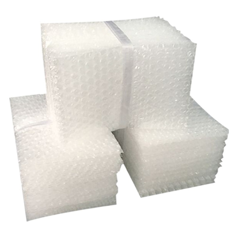 Bolsa de burbujas al por mayor bolsa de embalaje exprés de espuma de burbujas comercio electrónico bolsa de embalaje transparente gruesa a prueba de golpes fabricante de película de burbujas