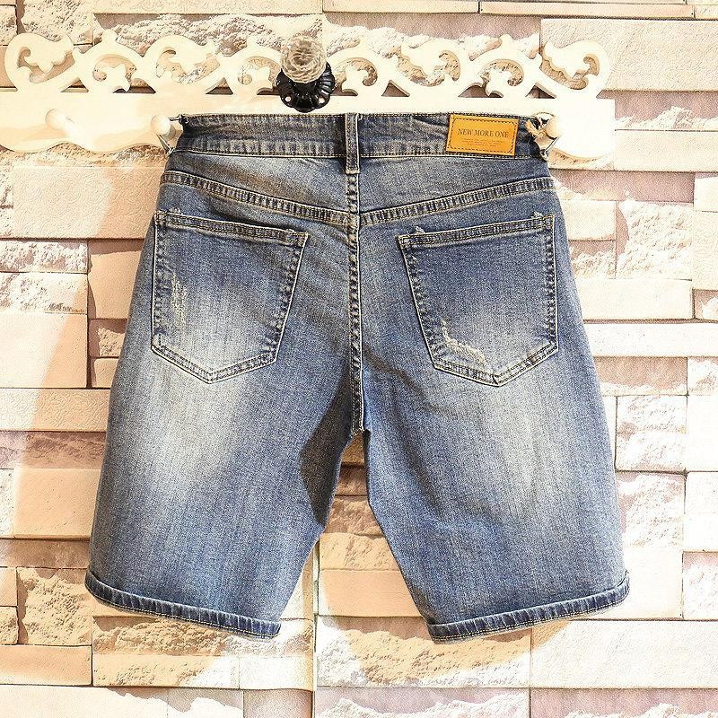 Verano marca de tendencia hombre jeans jeans de estilo coreano retro pantalones cortos rectos agujeros lavados con agua para hacer pantalones viejos