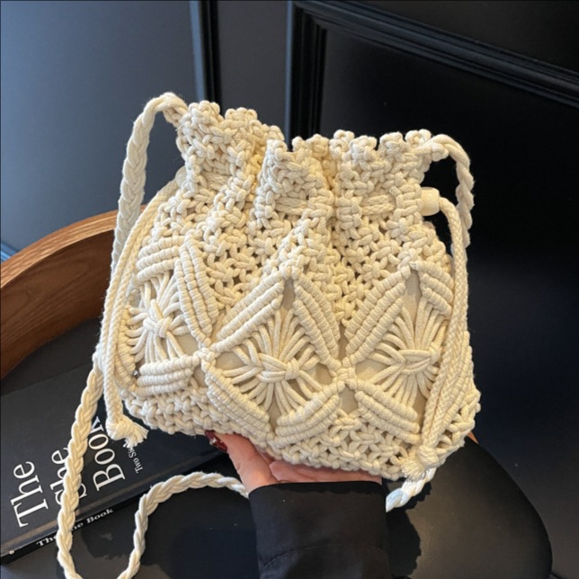 2025 verano nueva moda moda popular mochila de hombro de vacaciones de playa de viaje de playa bolsa de balde de tejido