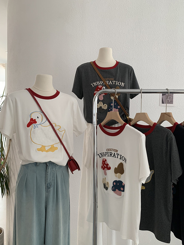 欧瑪莱は色の丸首のレースのアヒルにぶつかって布の半袖の正肩の頭のtシャツの韓系の百合の上着の3486を貼ります。|undefined