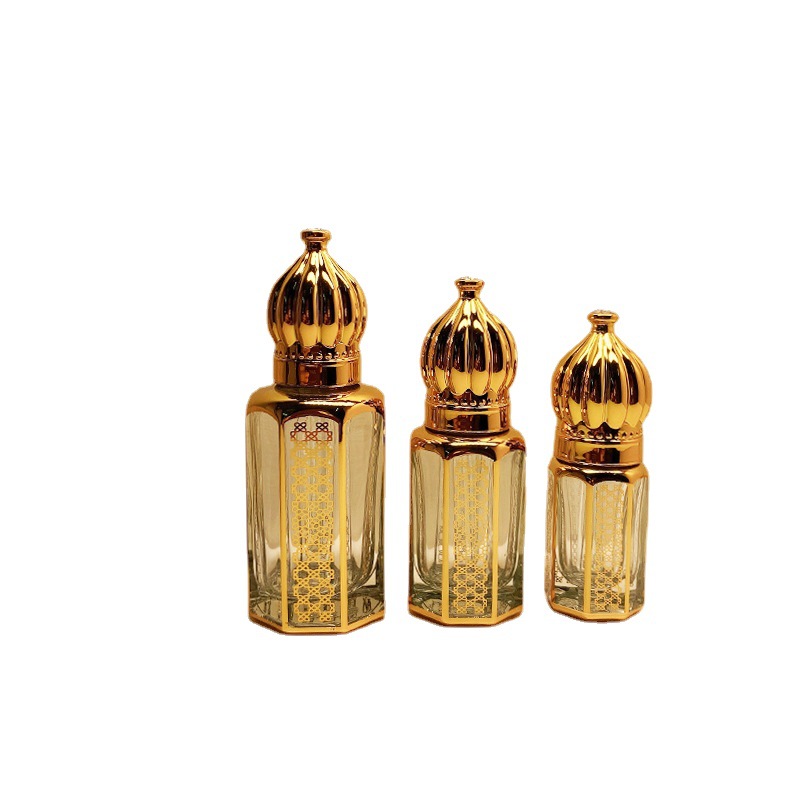 Dubai Perfume Aceite Esencial sub-botella artificial cristal artesanía metal transparente botella de perfume de vidrio dorado al por mayor
