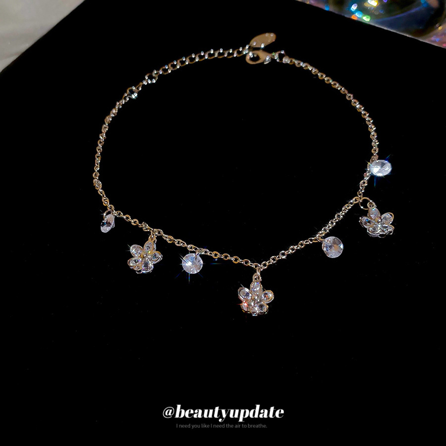 Colgante de flor redonda de circón tobillera para mujer, lujo ligero, sentido de alta gama, anillo de pie, nicho, moda simple, accesorios de pie de todo fósforo al por mayor