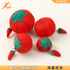 赤いトマトの針は針の包みの部品を挿します。