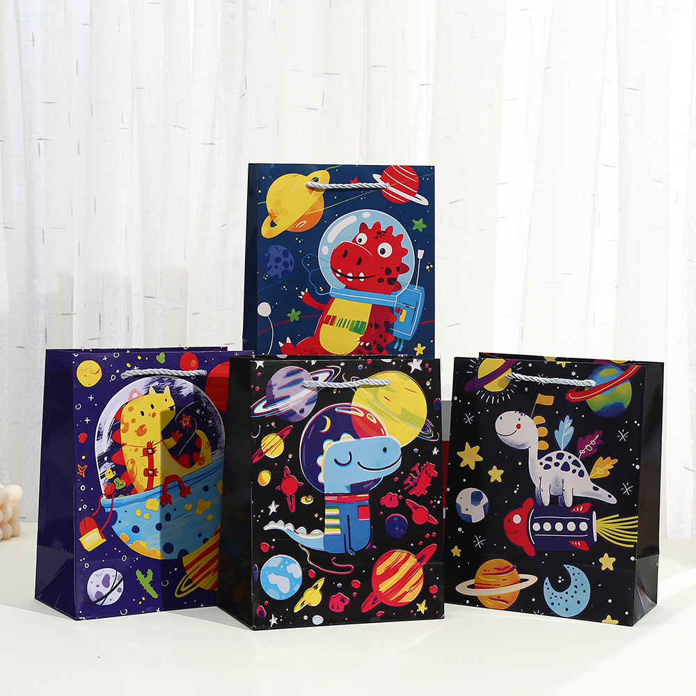 太空恐龙手提袋卡通印花包装袋白卡购物礼品袋批发派对糖果纸袋