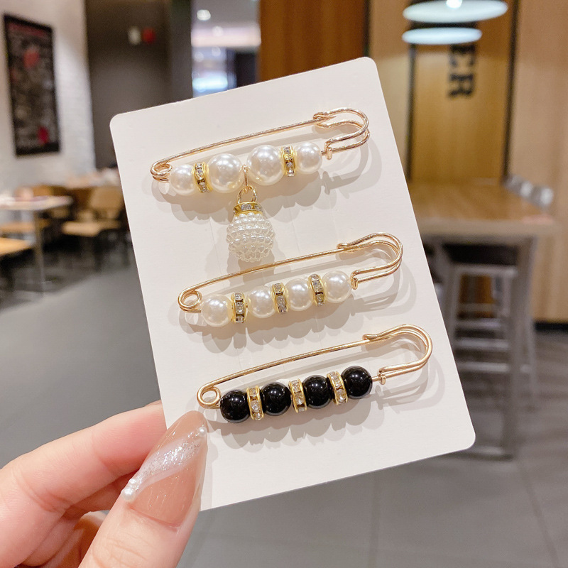 Broche de cintura para mujer falda apretada cintura artefacto pin fijo botón de botón anti-peregrino broche anti-peregrino