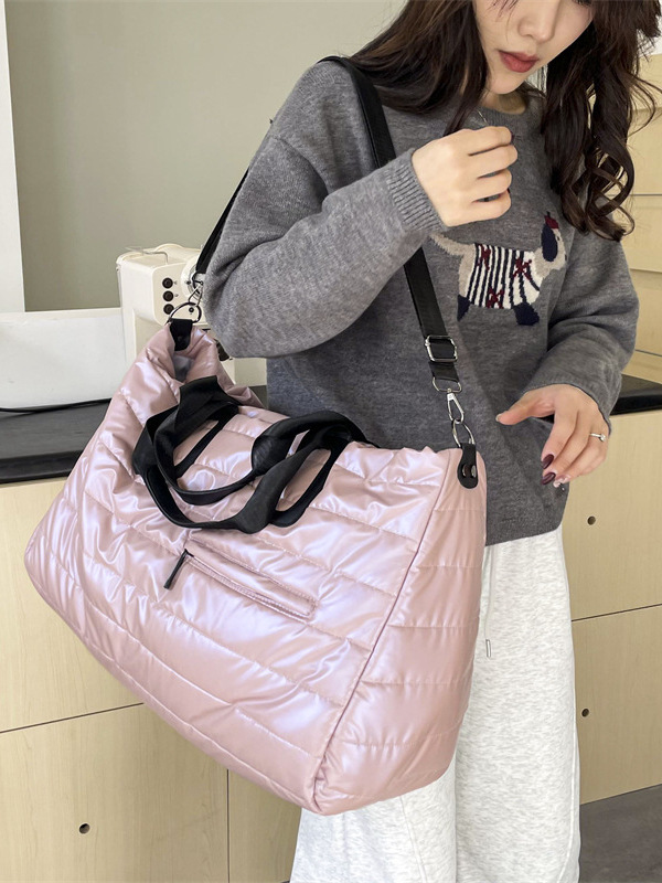 Otoño e invierno nuevo estilo de ropa de algodón de nicho bolso de mensajero de moda moderna para hombres y mujeres bolso de mensajero portátil de gran capacidad