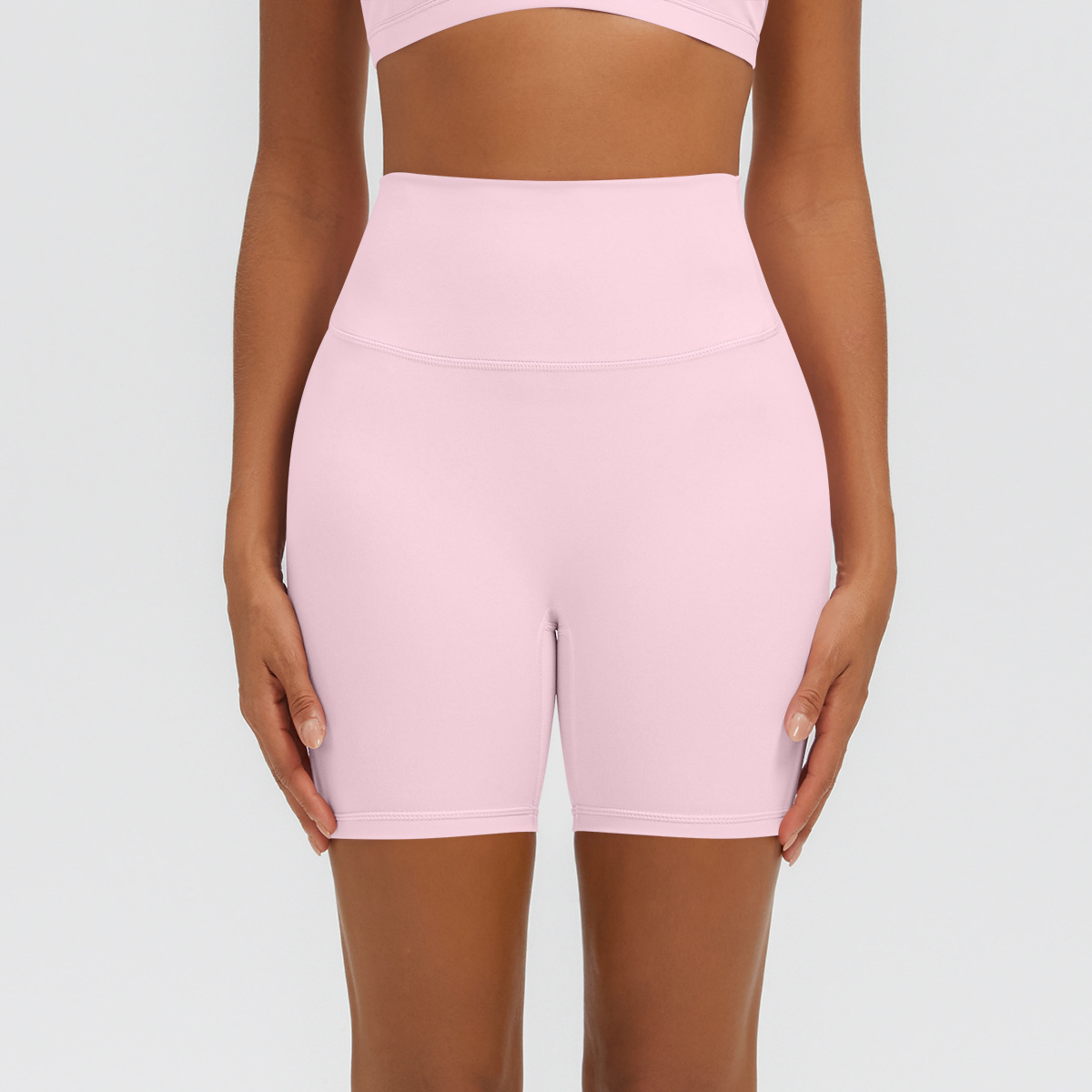 Nuevo tipo delgado de hielo, piel transpirable, ajustado, color sólido, ropa de yoga, pantalones cortos de tres puntos.