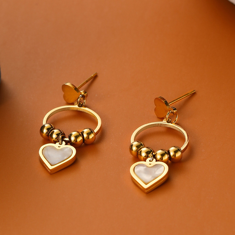 Oferta especial experiencia europea y americana joyería de acero titanio vacío galvanoplastia no decoloración no alérgica joyería pendientes collar fábrica al por mayor