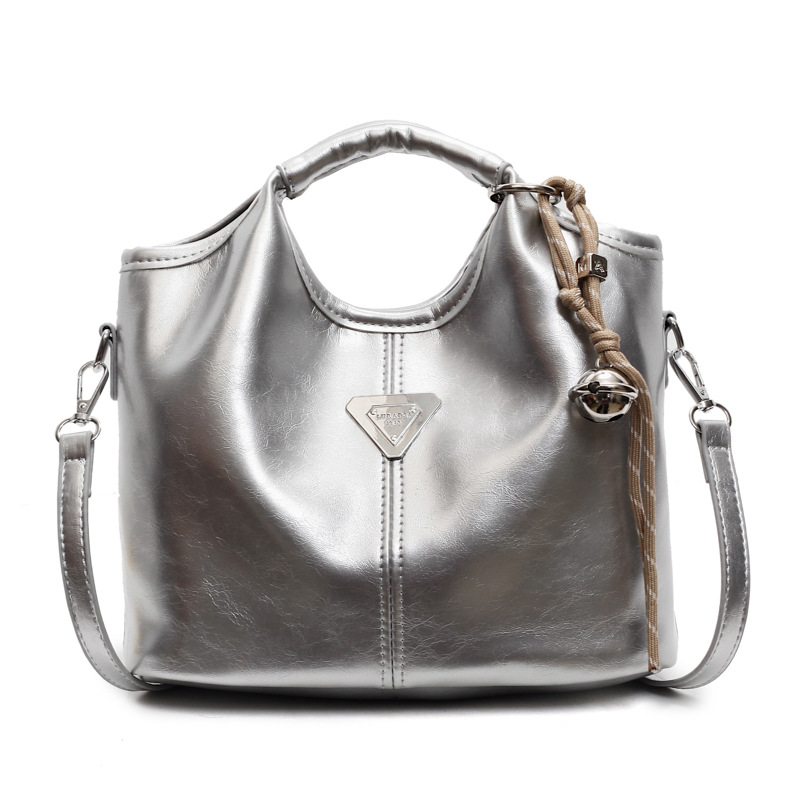 Popular bolso de mano super caliente para mujeres 2025 nueva moda versátil bolso de hombro para viajar bolso de cubo de textura superior