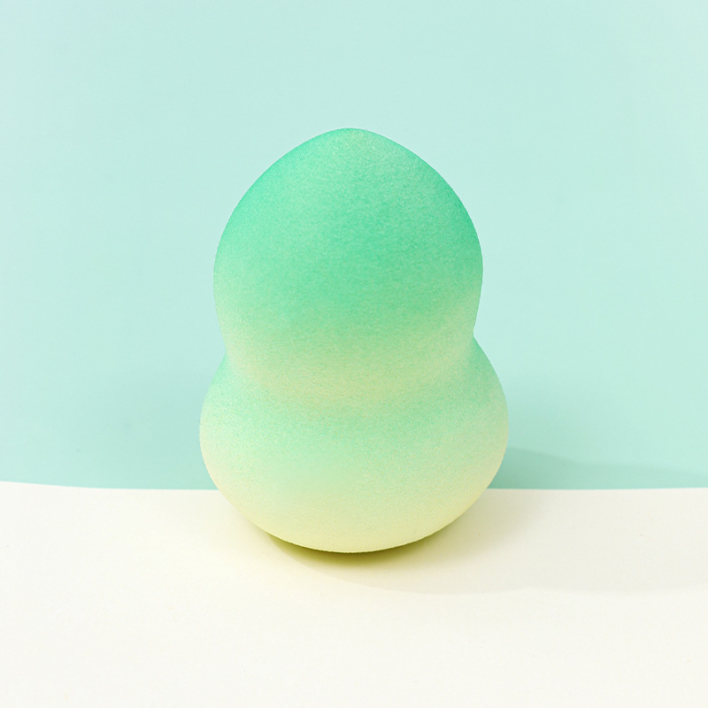 Fábrica personalizada de color degradado transfronterizo maquillaje de belleza huevo soplo de polvo no látex color en aerosol color mixto maquillaje esponja maquillaje huevo al por mayor