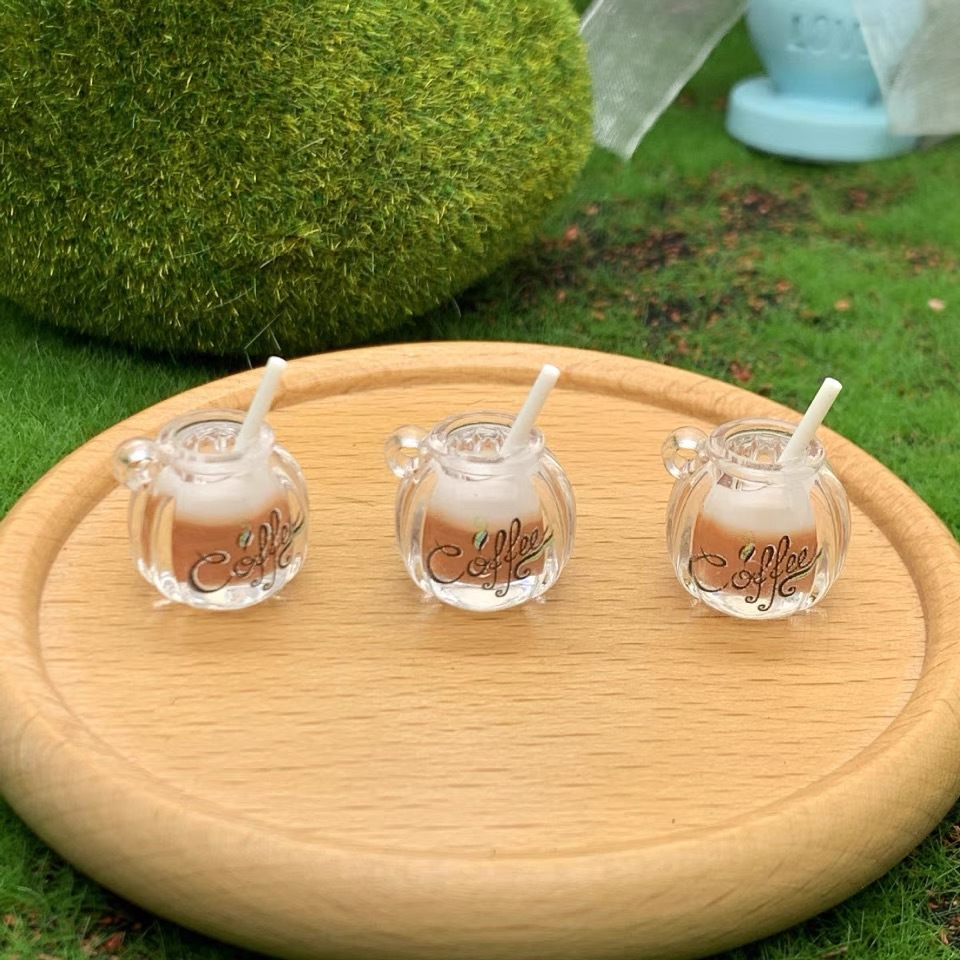 Suministro directo de fábrica de dos colores taza de café luminosa DIY accesorios para el cabello llavero mochila colgante material al por mayor diadema hecha a mano