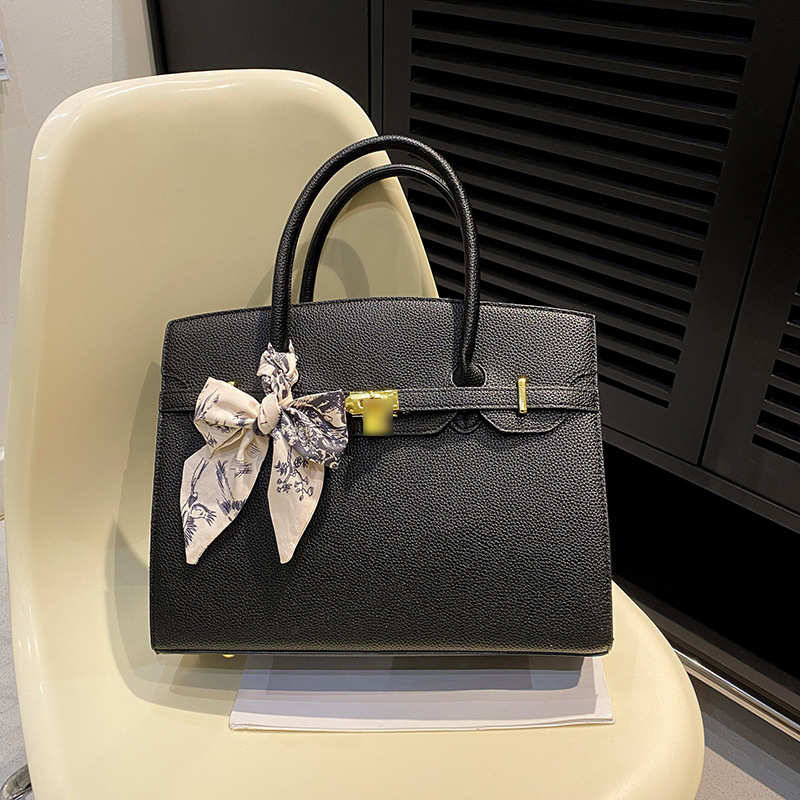 Gran capacidad de Kelly bolso para mujeres 2026 nuevo nicho de lujo viaje ligero bolso de hombro de alta sensación bolso de mujer