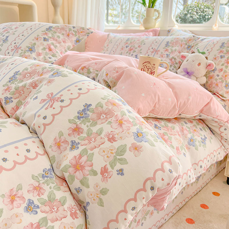 Conjunto de algodón de cuatro piezas de algodón 2025 nueva ropa de cama fresca funda de edredón floral sábana dormitorio juego de tres piezas