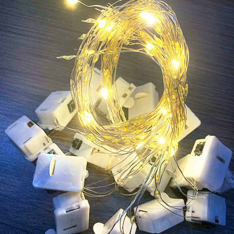 LEDの白い箱はランプのプレゼントの箱のケーキの花束をつないで雰囲気の銅線の明かりを飾ります。|undefined