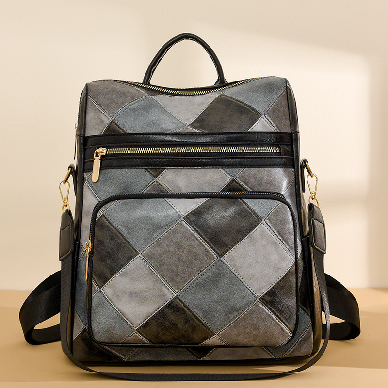 Comercio exterior al por mayor 2024 otoño nueva moda costura señoras mochila simple a cuadros mochila de viaje de doble uso marea