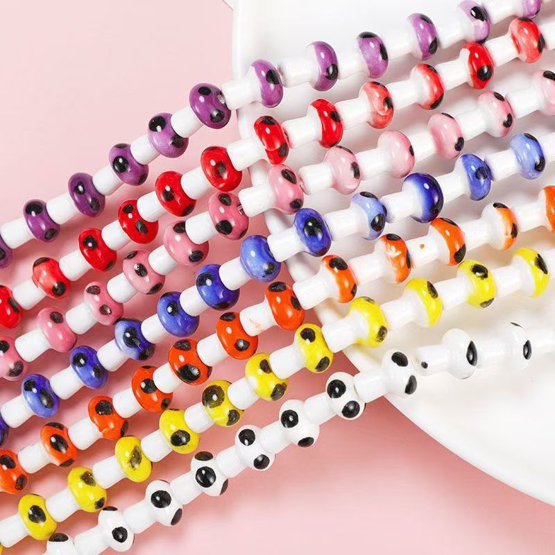 Cerámica de color simple perlada cara de pez cinco pétalos perlas de flores perlas sueltas diy accesorios de decoración de brazalete de cuentas hechas a mano