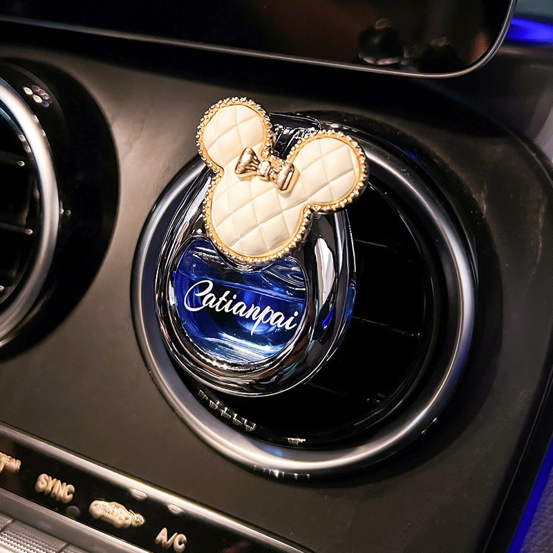 Perfumes de automóviles, salidas de aire, adornos de automóviles