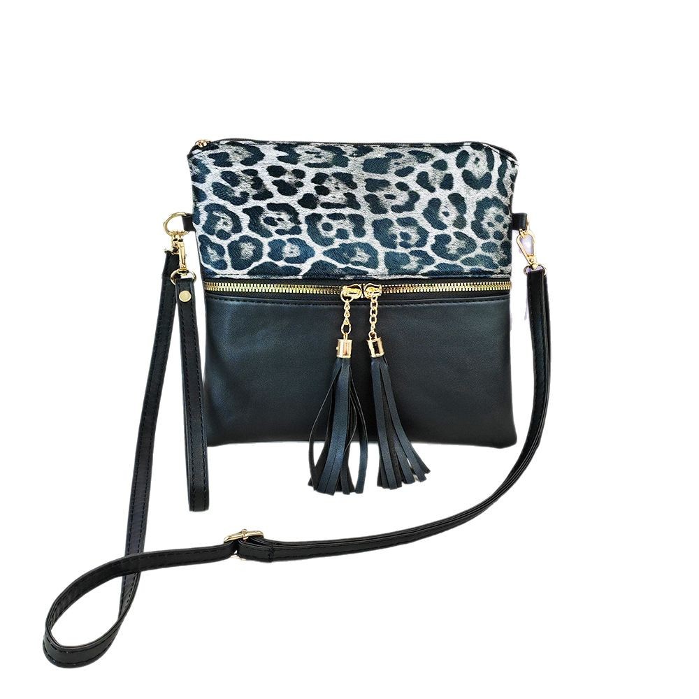 Bolso de leopardo de mujer bolso de moda europeo y americano nuevo bolso inclinado de hombro único bolso de color de choque ultrafino bolso de mano con borlas