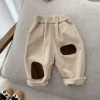 M beige