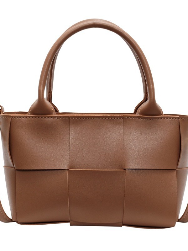 Diseño coreano de nicho de alta sensación portátil bolso de cubo de moda para mujeres 2024 nuevo tejido retro hombro mochila