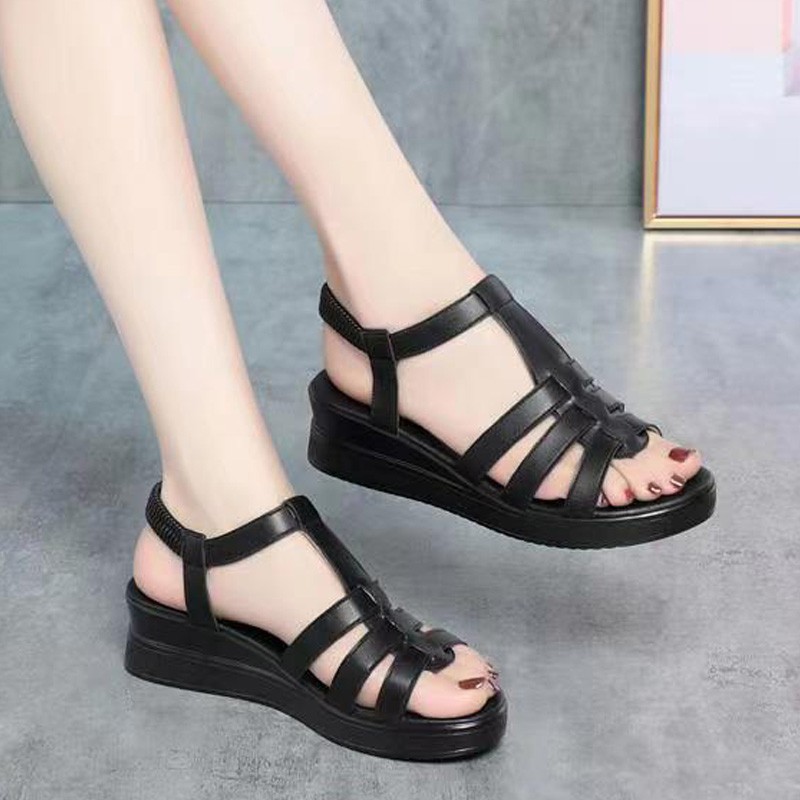 2026 verano nuevo cuero suave anti-derrapante sandalias romanas retro moda elástica zapatos de madre de talón de pendiente