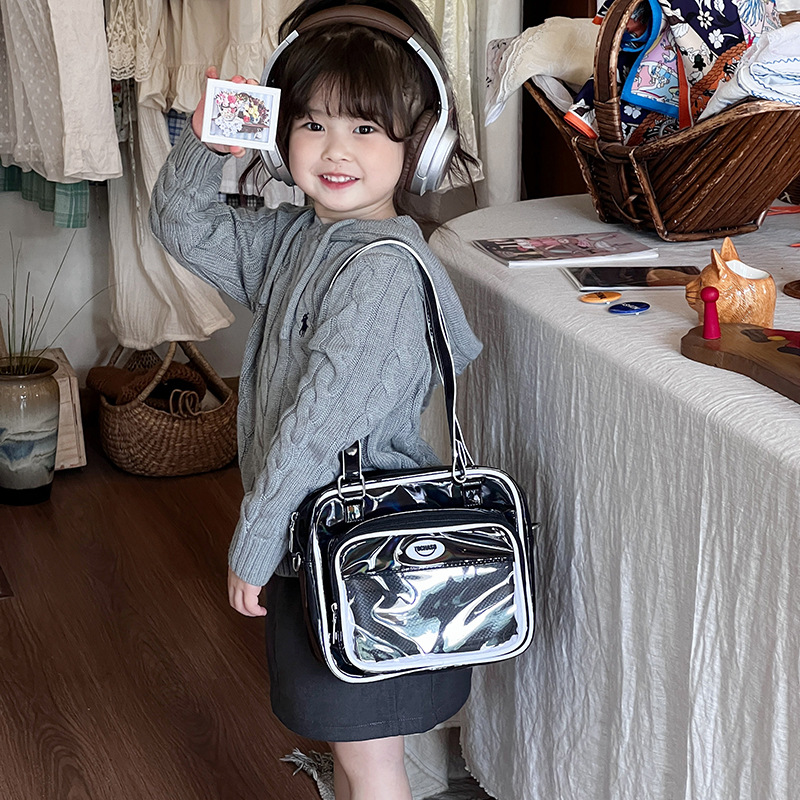 Paquete de dolor de comida de dos dimensiones japonesa 2025 nuevo paquete de hombro transparente para niños y niñas bolsas animadas de moda para niños