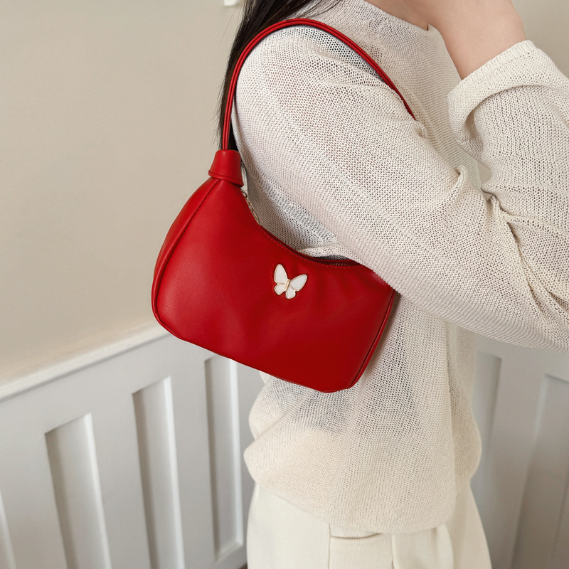 Coreana simple color sólido bolso de hombro para niños y niñas, pequeño y exquisito bolso de mano para bebés mariposa 2026 nuevo bolso para niños