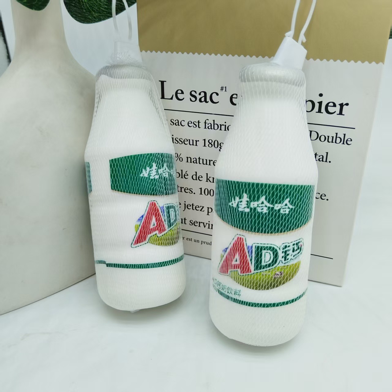 Wahaha ADcalcio pellizcando la botella de música juguete rebote lento descompresión ventilación bebida exprimida suave personalizada para niños