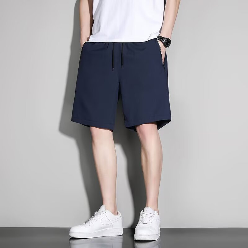 Fábrica de secado rápido pantalones cortos de hombre de verano hielo delgado para usar pantalones sueltos nuevos pantalones deportivos casuales de cinco puntos