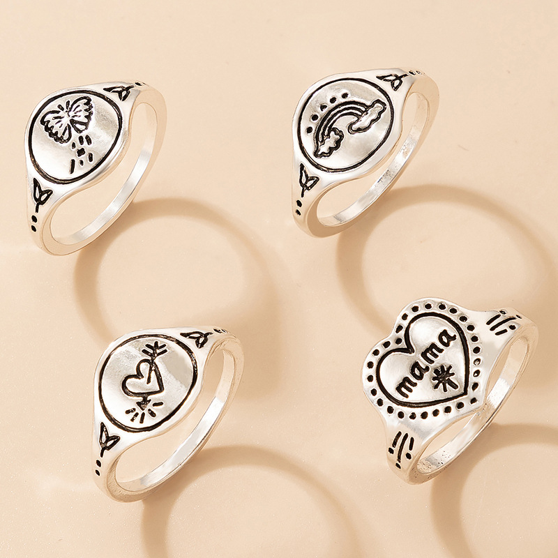 Fashion Hip-hop Jewelry Retro Letter Love Ring Four-piece Rainbow Butterfly Ring Set display picture 3