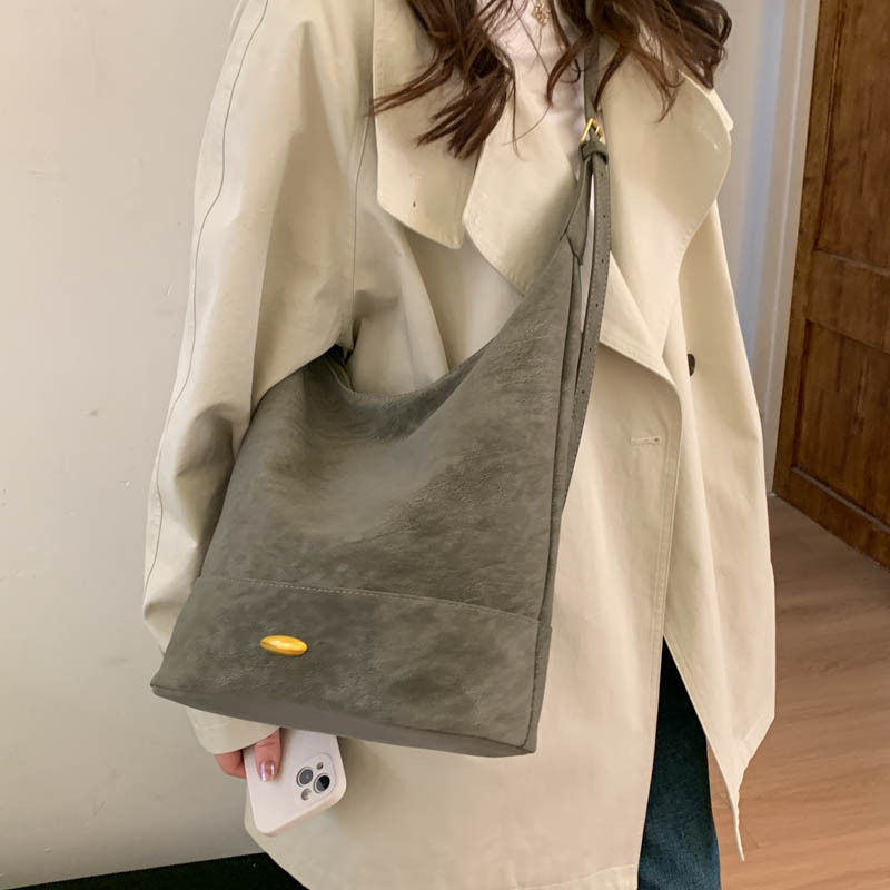 Coreano relajado sensación de colapsar bolso de cubo de seda bolso de mujer 2025 nuevo retro bolso de hombro bolso de viaje