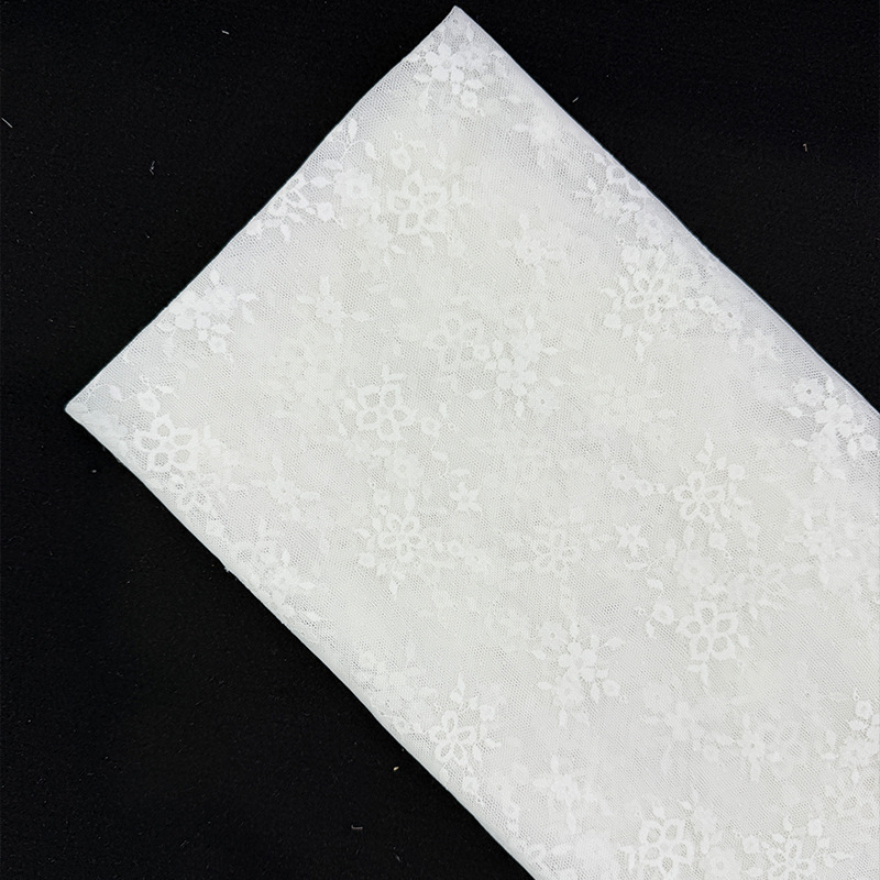 2026 nuevo diseño de moda semitransparente de encaje de amoniaco base de fábrica de falda superior tela spot