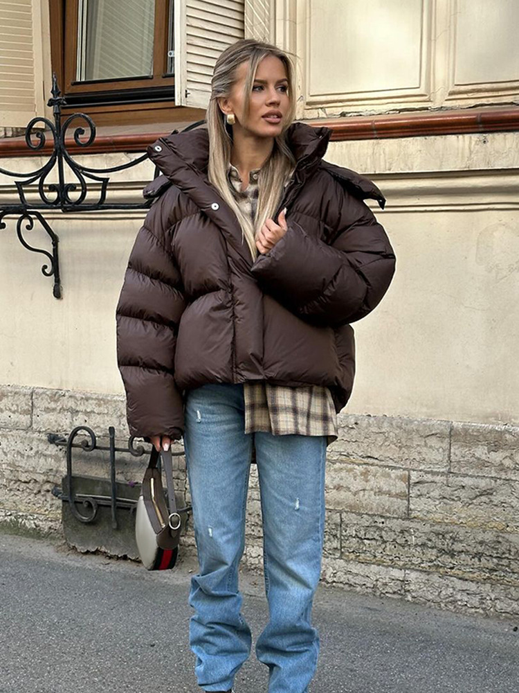 Collar vertical de otoño y invierno, temperamento de color sólido con sombrero, ropa de algodón de mangas largas para mujeres, 2025 nuevo estilo de invierno europeo y americano transfronterizo