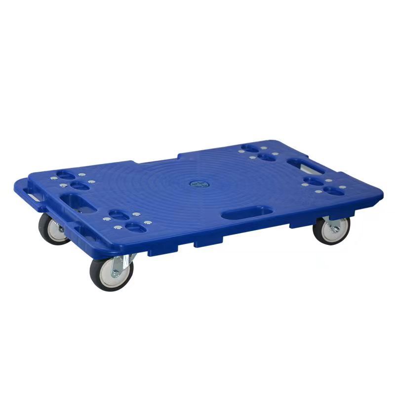 亀の車の台車はトラックのワゴンの手押し車を引っ張ります。