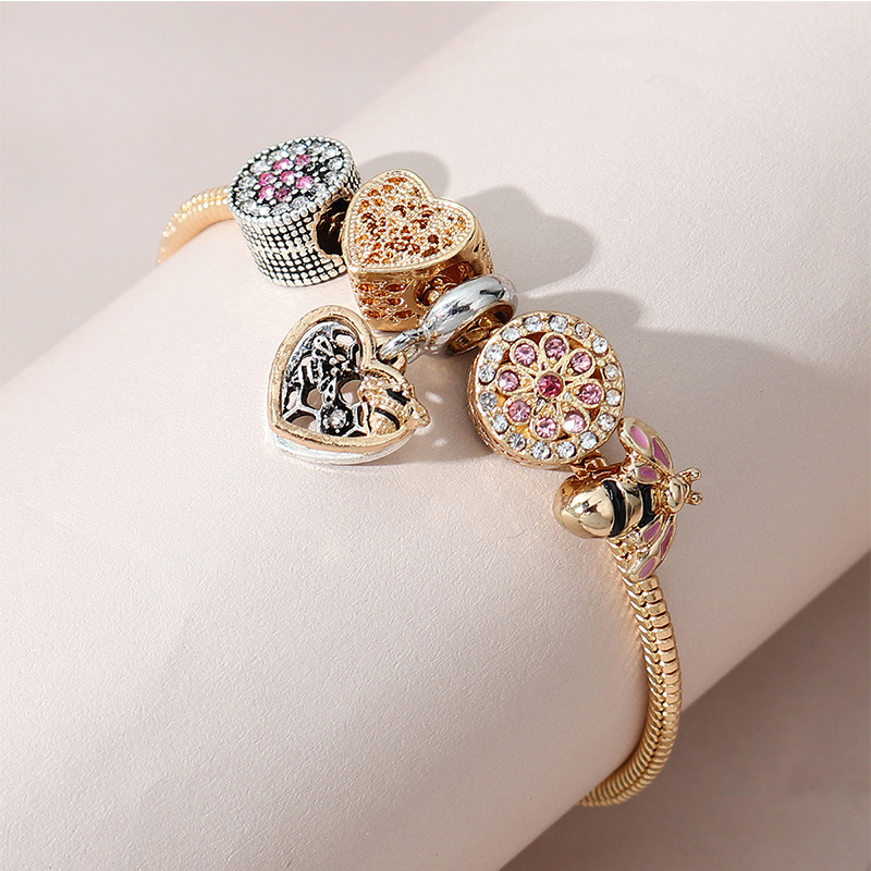 Panjia pulsera Dora DIY cuentas transfronterizas abejas goteando aceite redondo aleación de diamante adhesivo brazalete colgante en forma de corazón