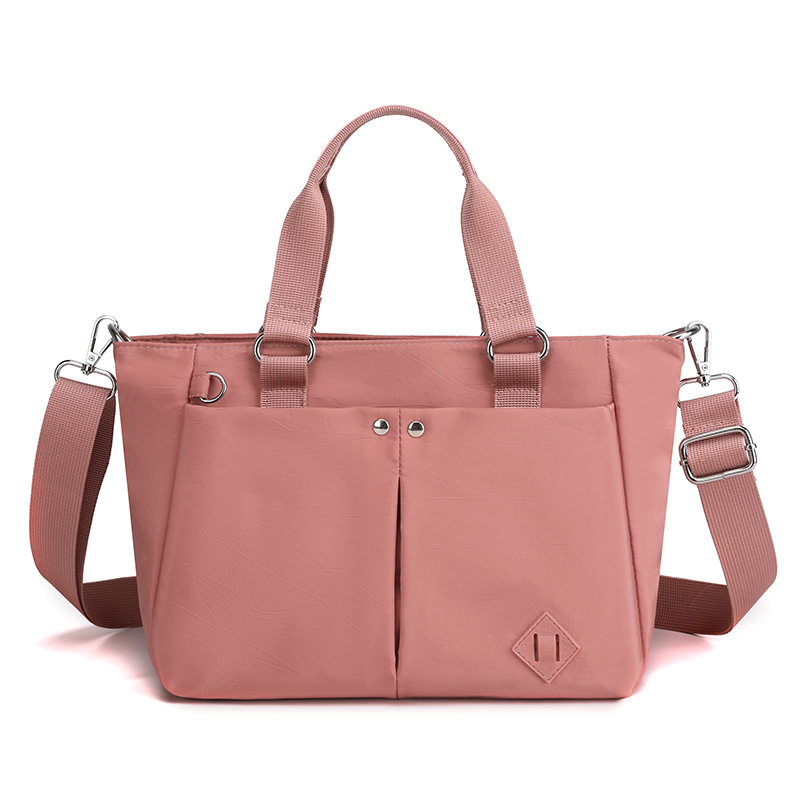 Nuevas tendencias de moda en 2025 bolsos de hombro de varias capas bolsos de hombro de gran capacidad para viajar y evitar salpicaduras de agua mochilas de versión coreana