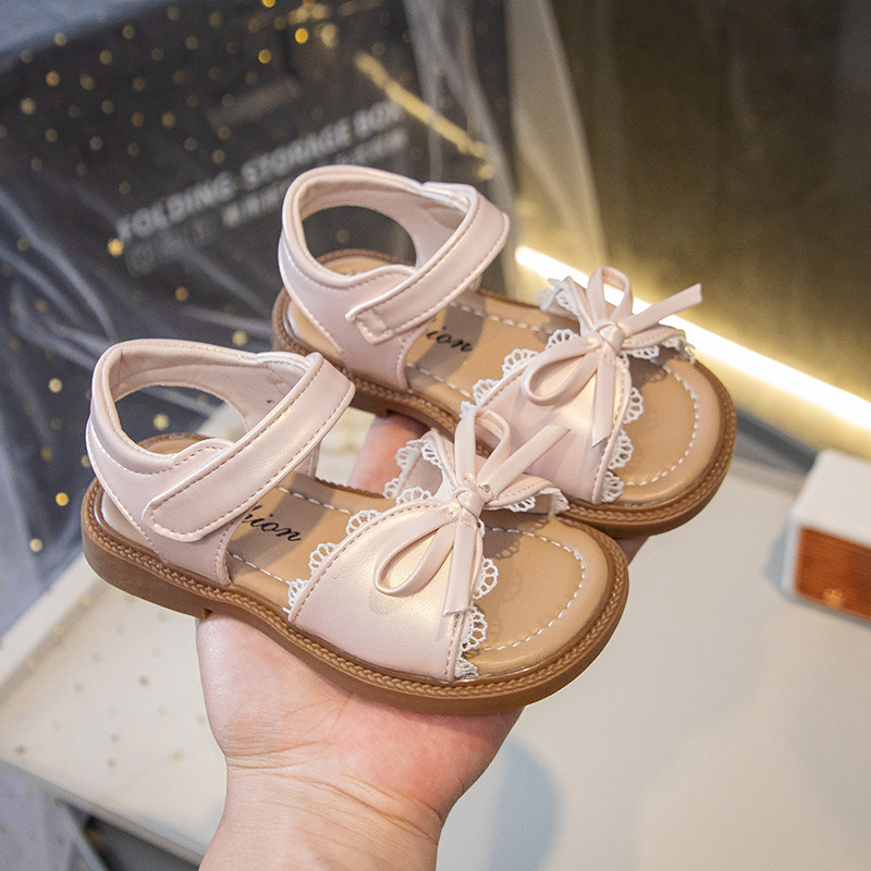Sandalias para niñas 2025 nuevo estilo verano niña bebé casual zapatos de playa de suela blanda zapatos de princesa con lazo de estilo occidental para niños image 3