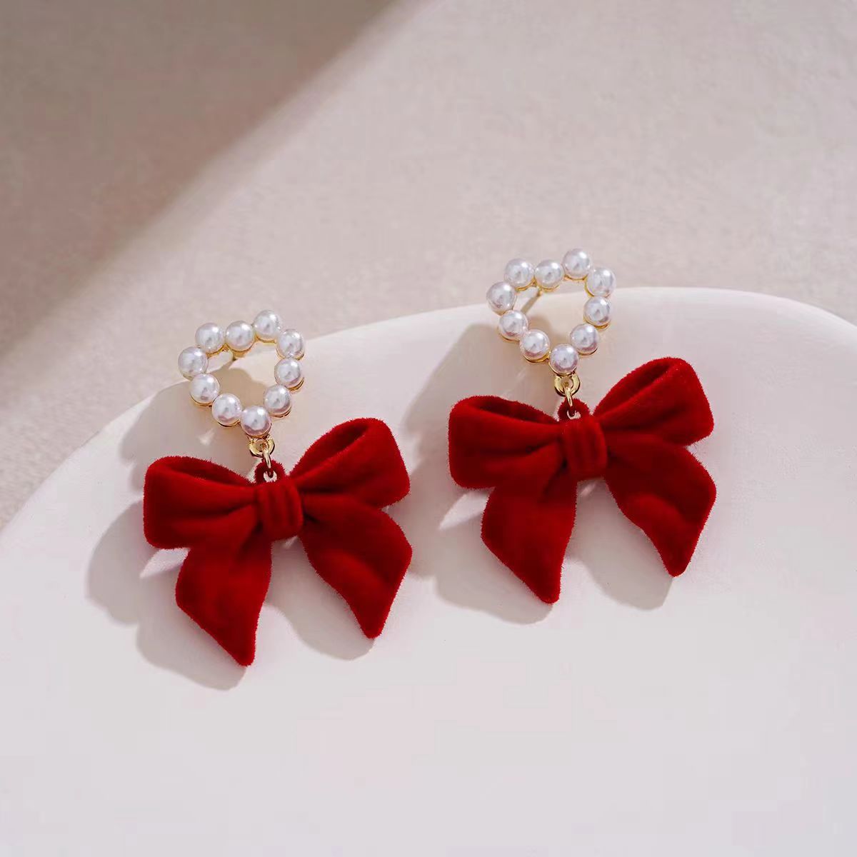Burgundy retro earrings with bow heart-shaped