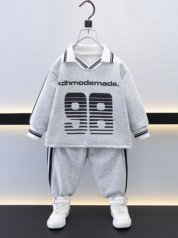 7688 Traje de suéter fresco de moda para niños Primavera y otoño Manga larga suelta deportiva Traje de dos piezas 2025 Nueva ropa casual para niños