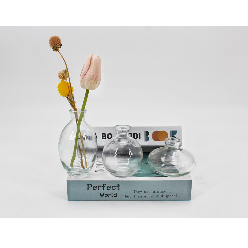 Customizado Amazon alto borosilicato de vidrio pequeño jarrón ligero de lujo jarrón de vidrio transparente adornos de boda inswind